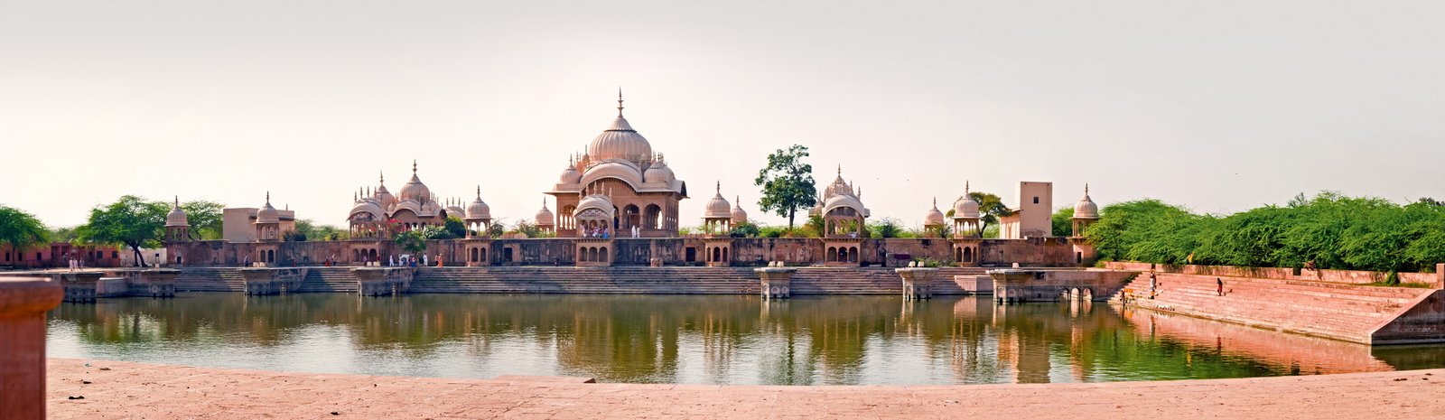 orange concrete buildings near body of water wallpaper kusum sarovar 2k 4k 5k 8k