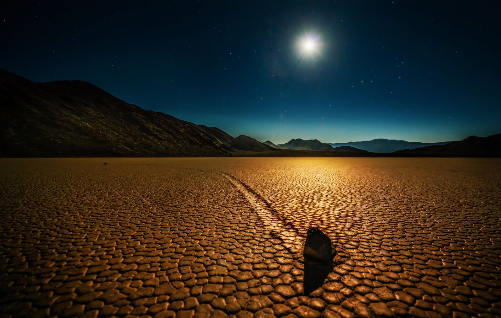 brown soil near mountain during nighttime Mysterious Rock Death Valley california 2k 4k 5k