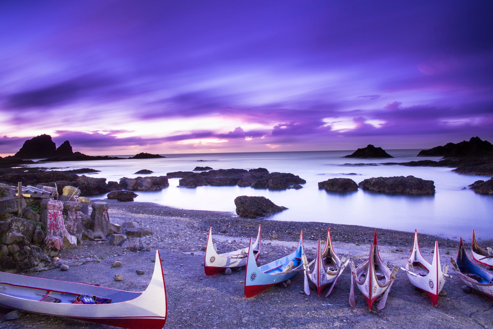 seven boats on seashore under purple clouds blue sky ponso 2k 4k 5k