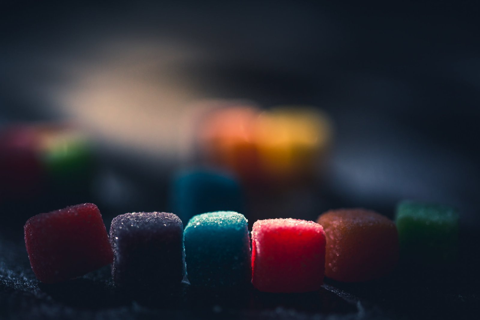 assorted color candies dark colorful sweets food macro medicine 2k