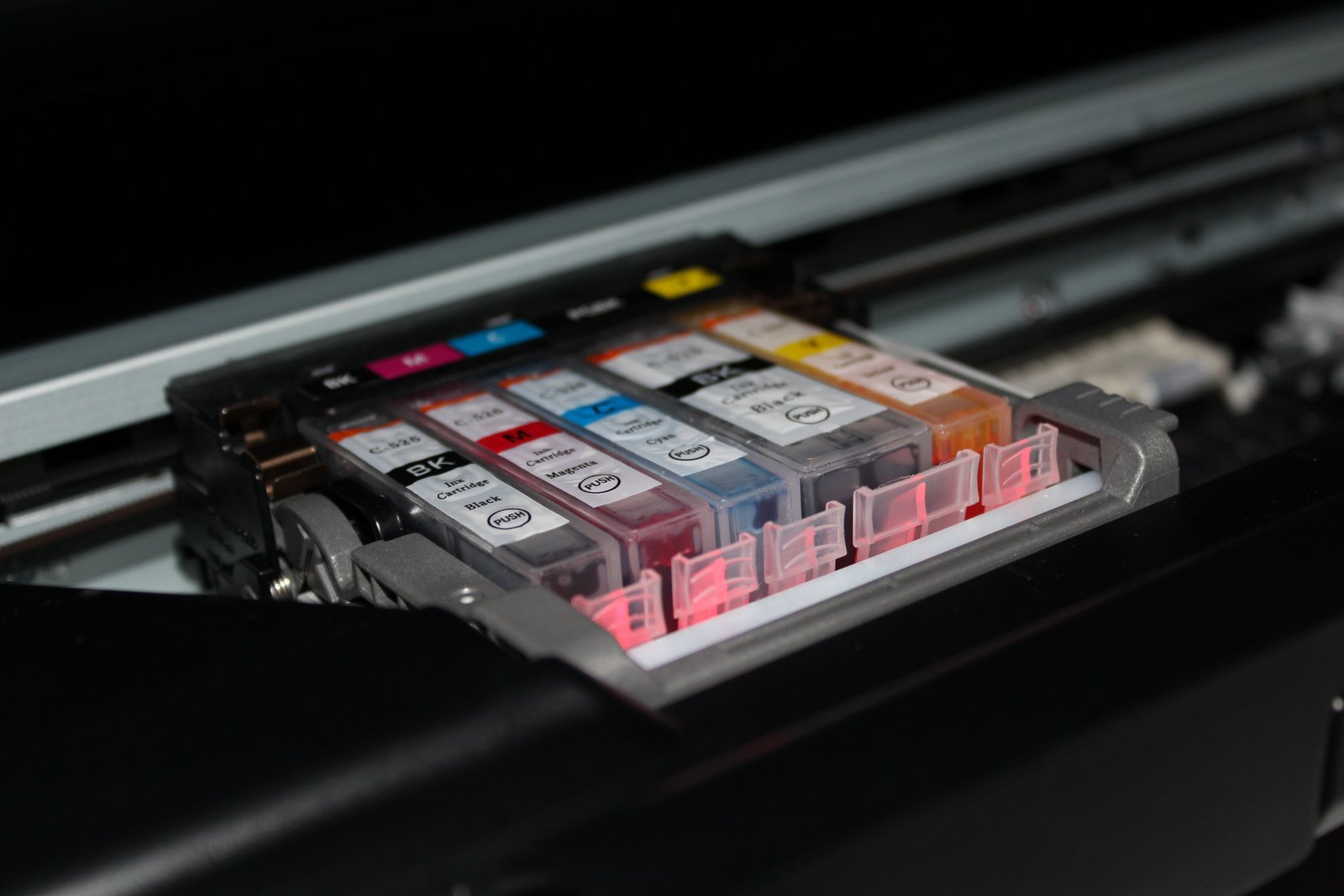 macro shot photography of ink cartridges cmyk printer colors 2k 4k 5k