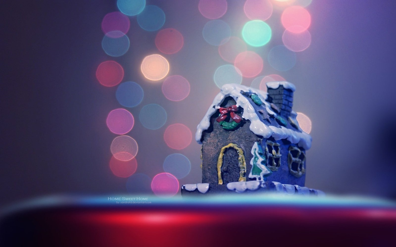 black and gray house miniature Christmas cake bokeh christmas lights 2k