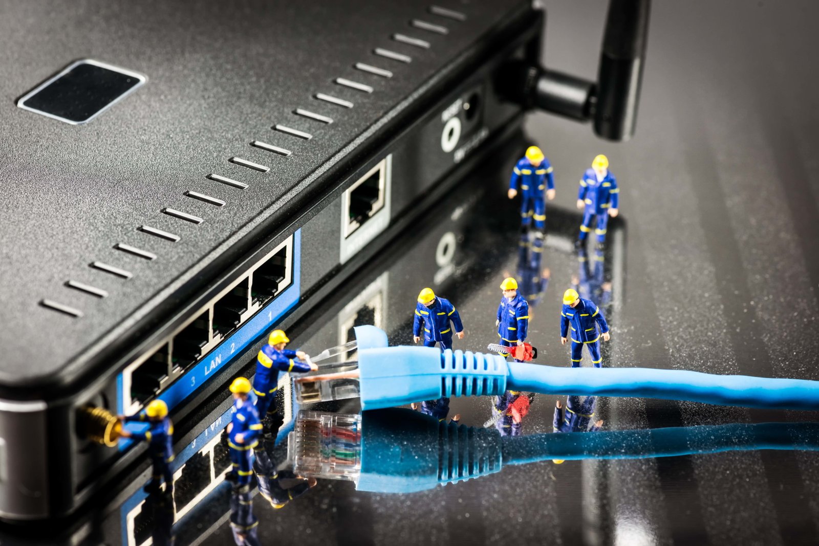 blue ethernet cable and black wireless router connection diagnosis 2k 4k 5k