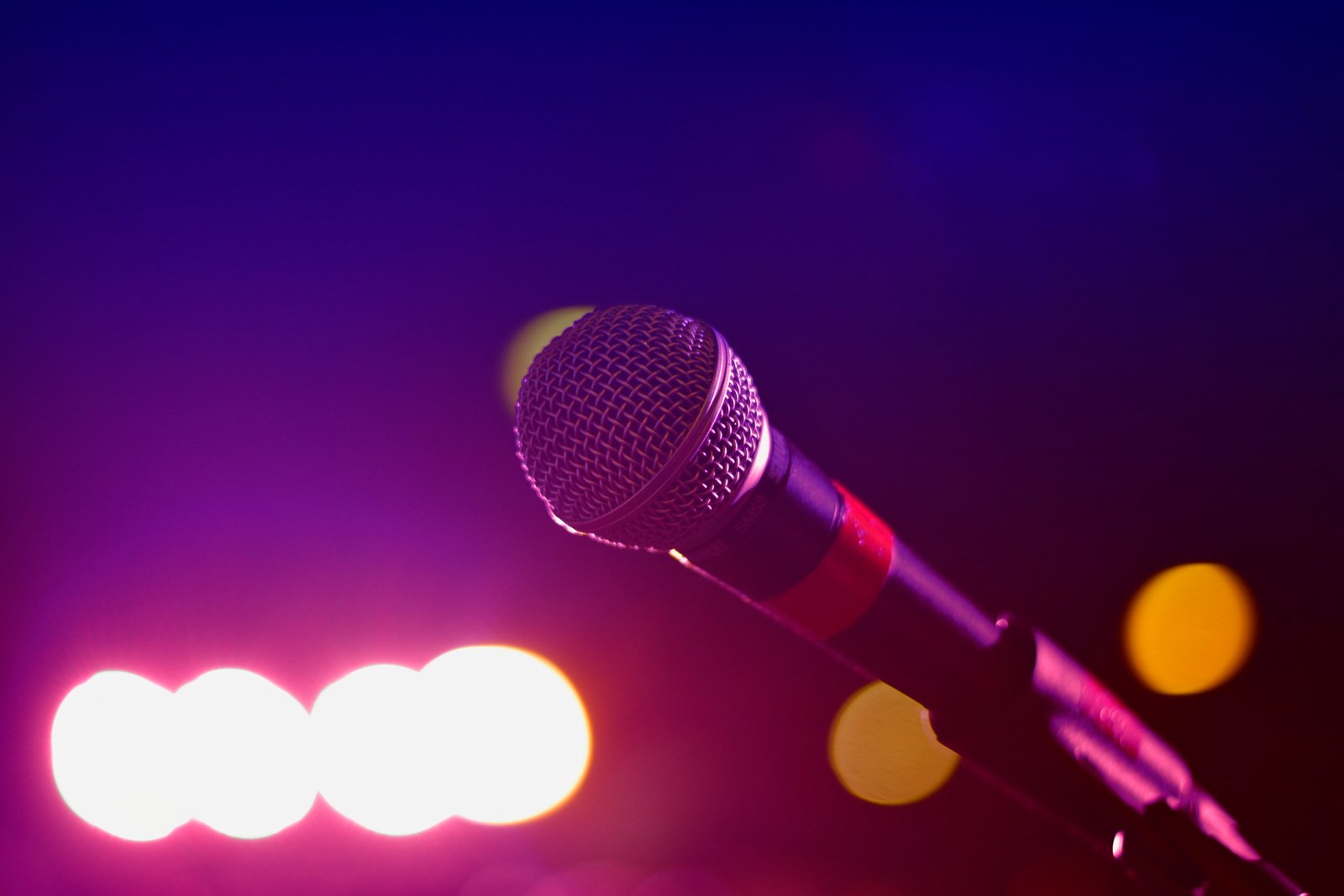 bokeh photography of microphone black music musician band 2k 4k 5k