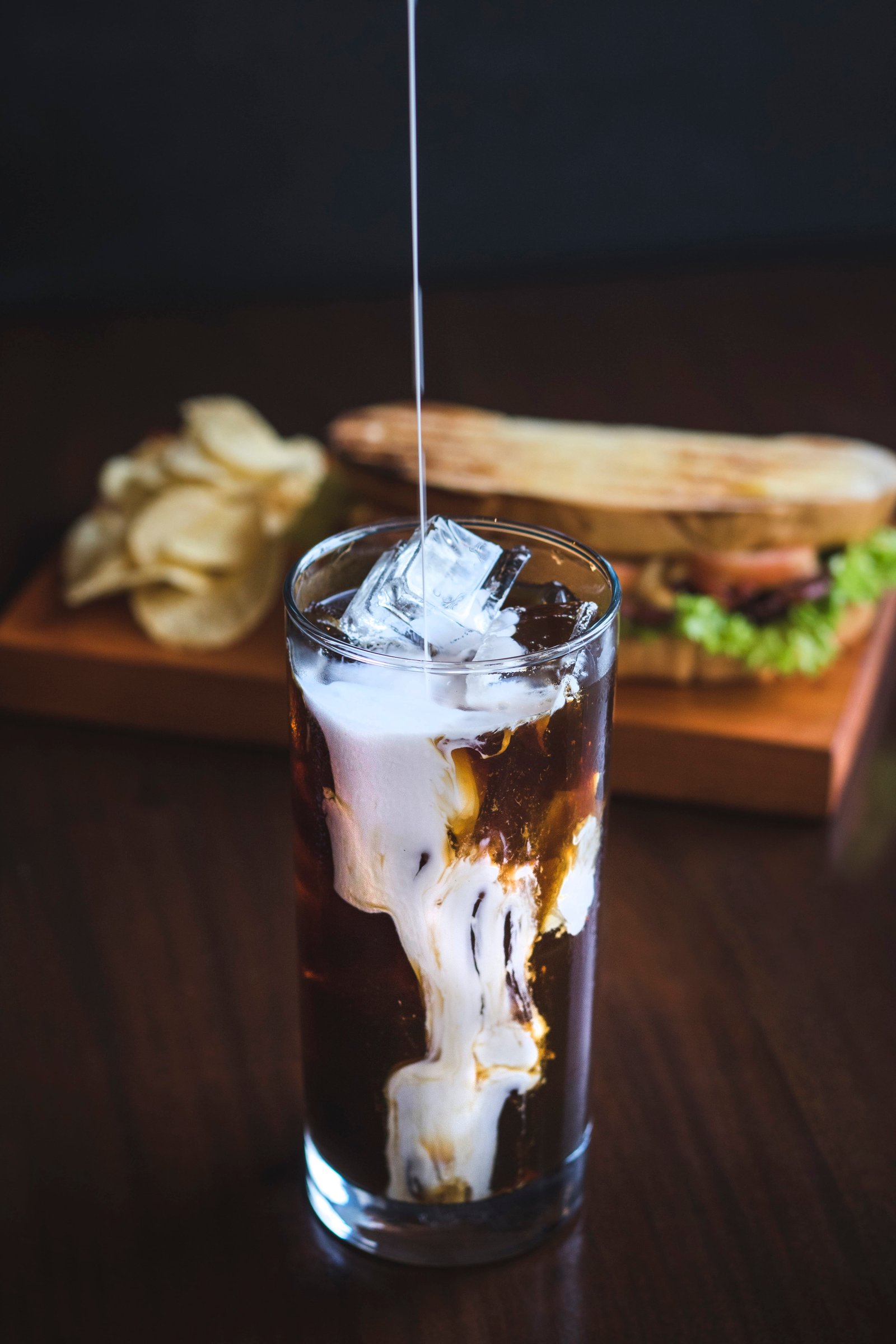 close up photo of beverage in clear drinking glass coffee cup 2k 4k