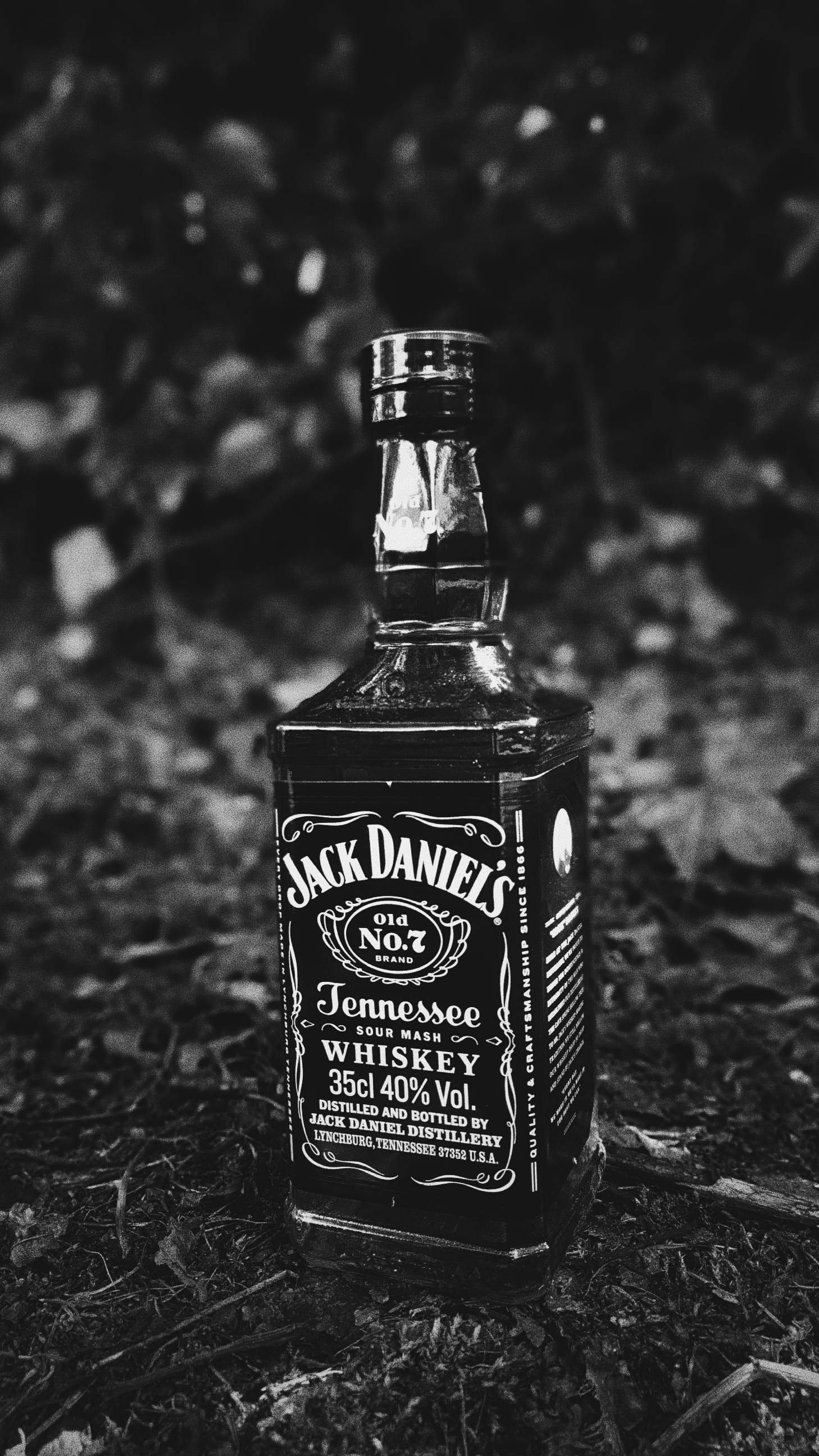Jack Daniel s Old No 7 Whiskey grayscale photography of Tennessee whiskey bottle
