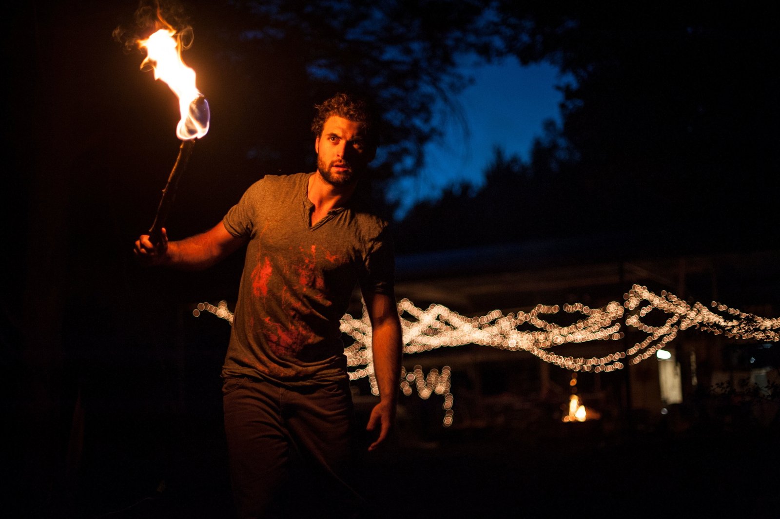 man holding light torch night time people guy fire flame 2k 4k