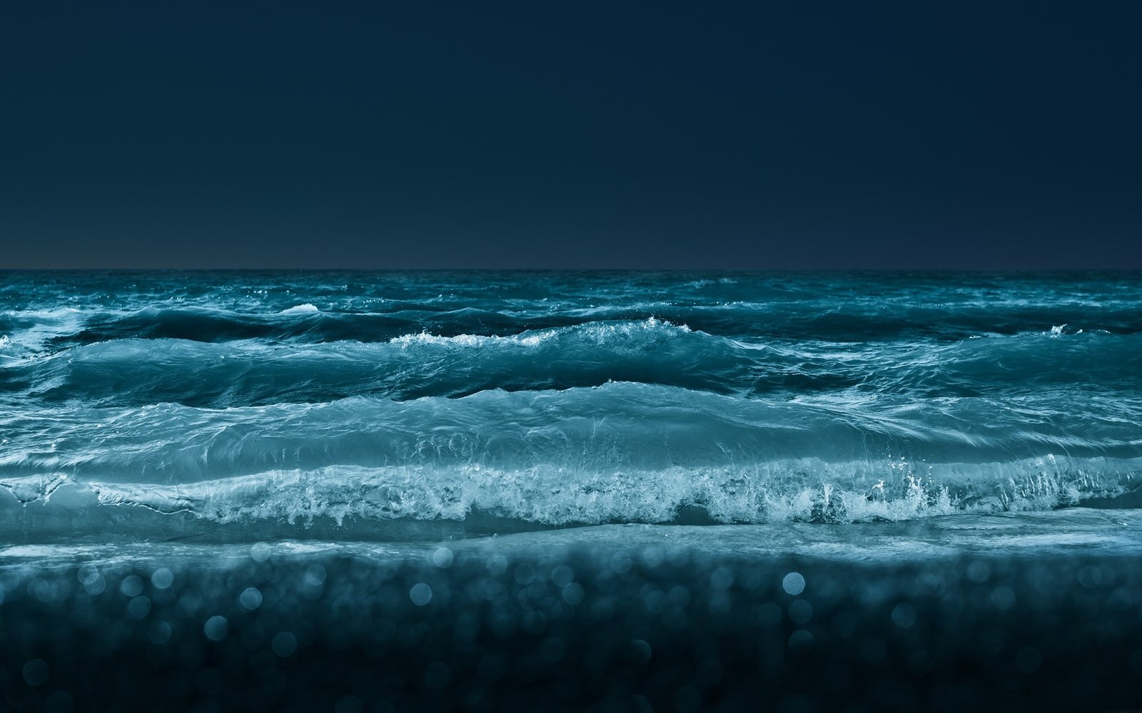 ocean waves photography of body water during night time beach 2k
