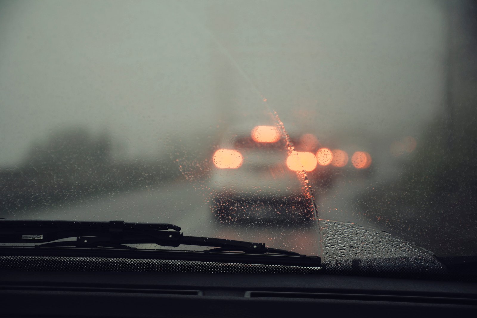 vehicle glass with water droplets windscreen light rain windshield 2k 4k 5k