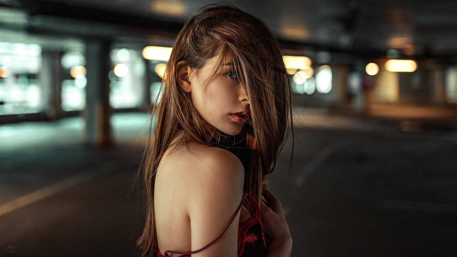 women s red and black top shallow focus photography of woman in spaghetti strap dress during daytime 56 2k