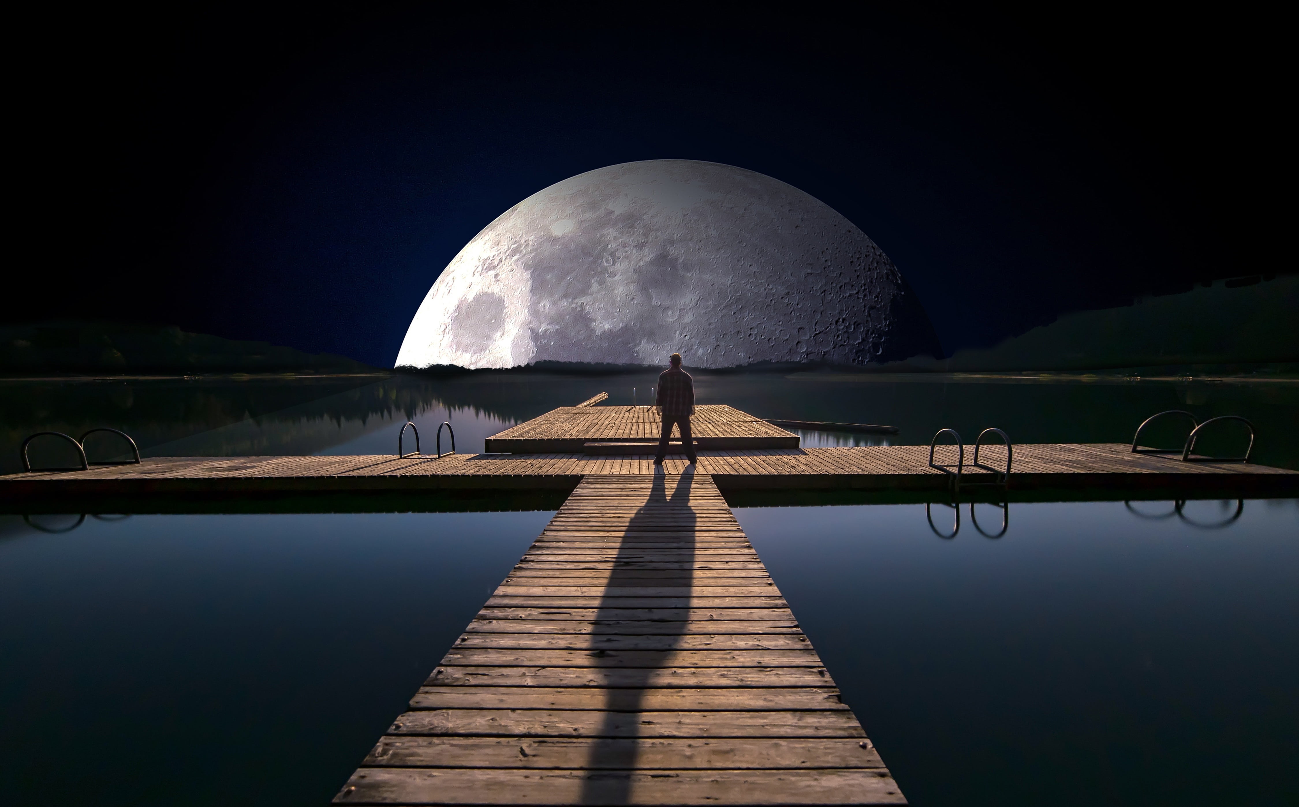 man standing on wooden dock at night lake web full moon water 2k 4k 5k