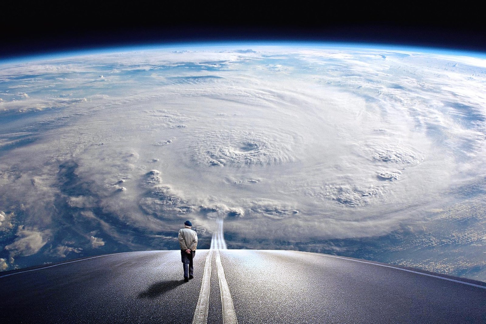 person walking on road background of earth When Breath Becomes Air 2k