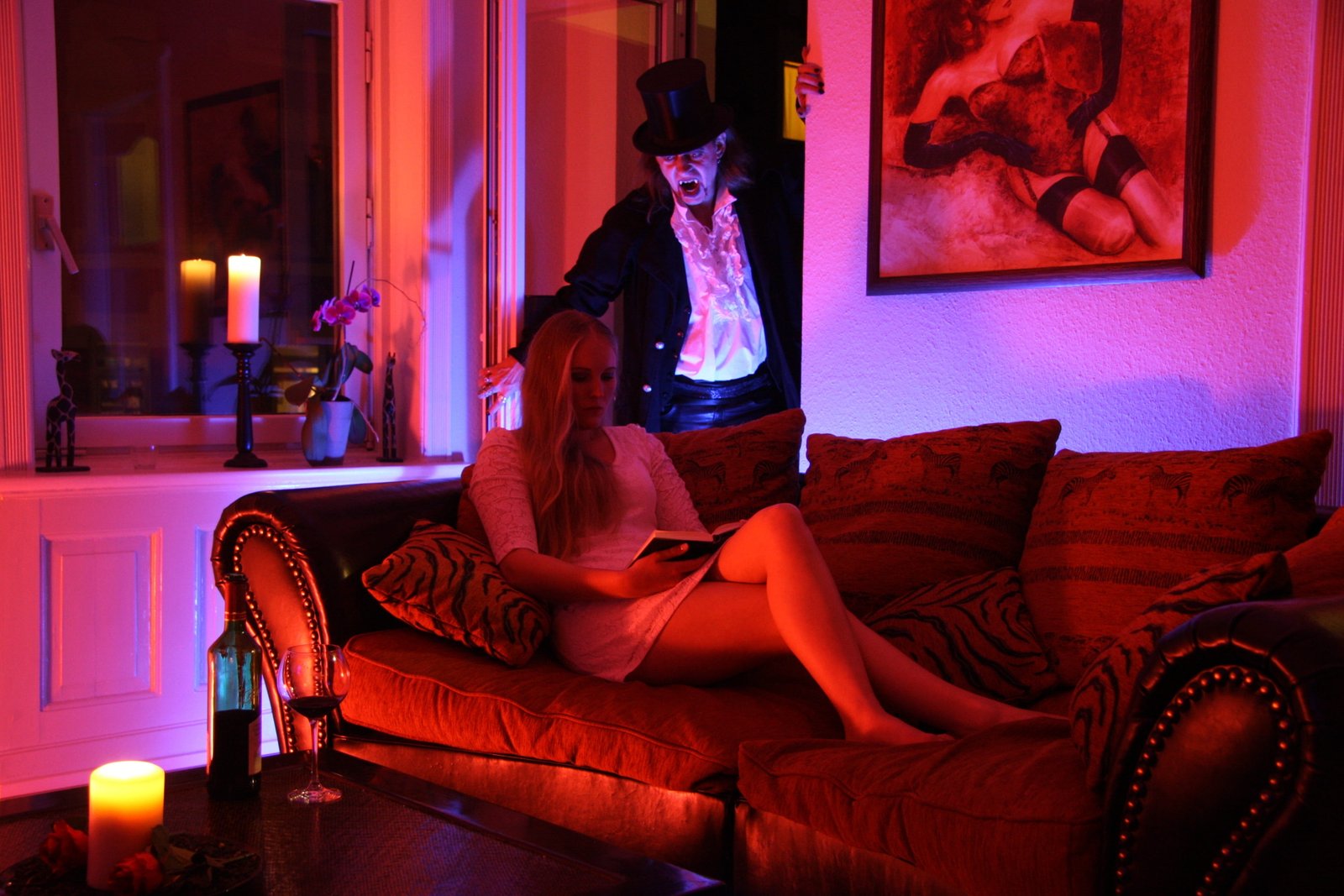 woman lying on couch near magician horror monster female creepy 2k 4k