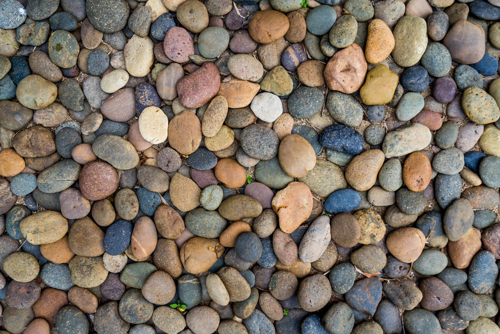 white yellow and blue stone pebbles beach stones background 2k 4k 5k
