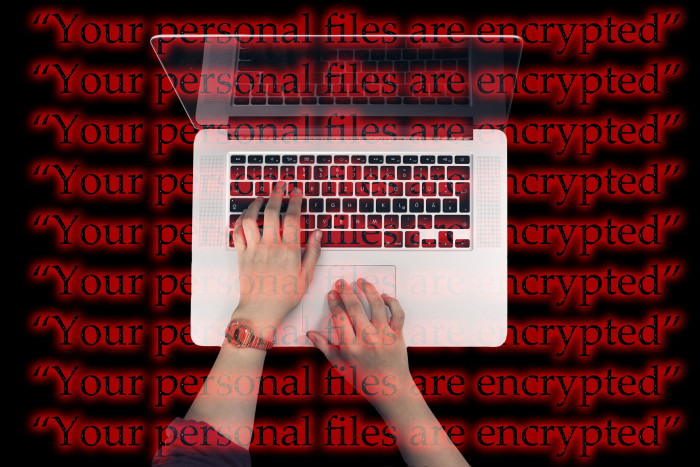 person using MacBook Pro Laptop Keyboard Cyber Attack wannacry 2k 4k 5k