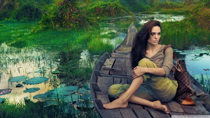 angelina jolie riding a boat actress hollywood