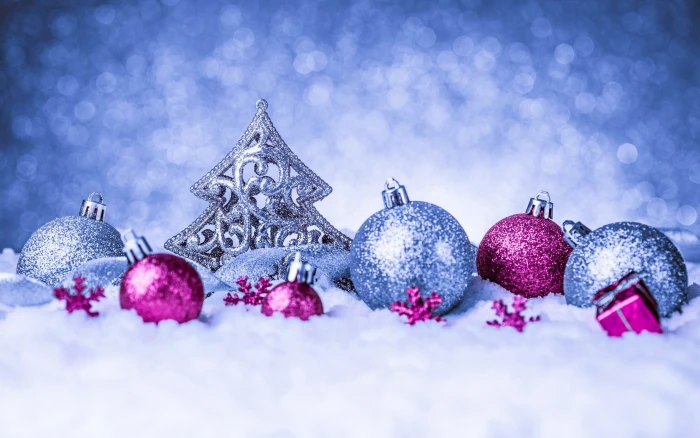 three purple and gray baubles Christmas ornaments closeup 2k