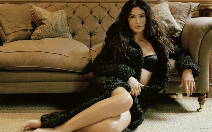 Actresses Monica Bellucci sofa furniture sitting indoors