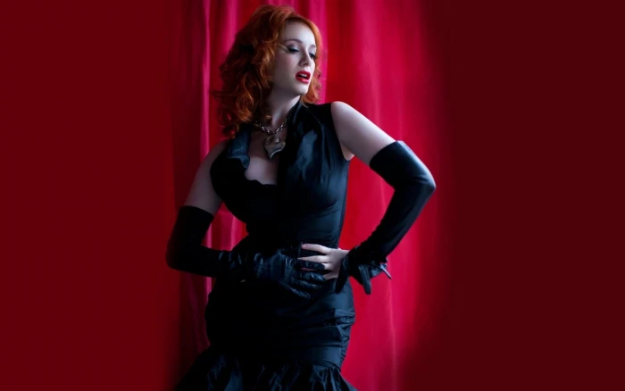 Christina Hendricks redhead dress actress red background