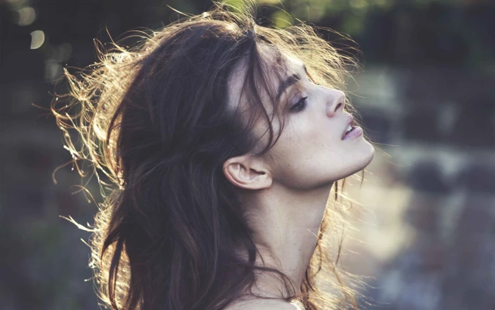 close up photo of woman with black hair women Keira Knightley