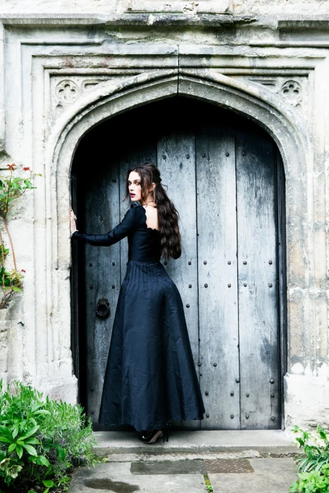 Keira Knightley actress brunette black clothing looking back