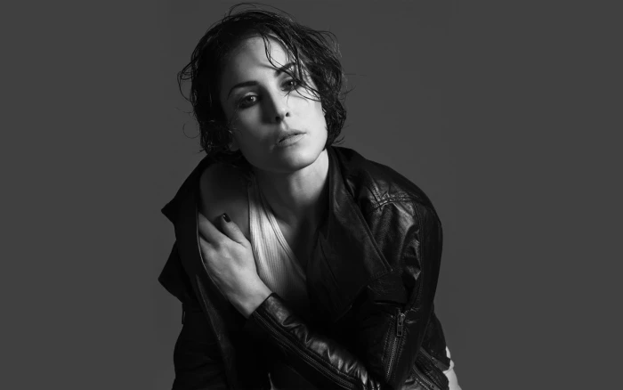 Noomi Rapace actress monochrome leather jackets