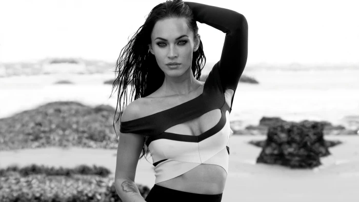 Megan Fox monochrome arms up tattoo cleavage actress women