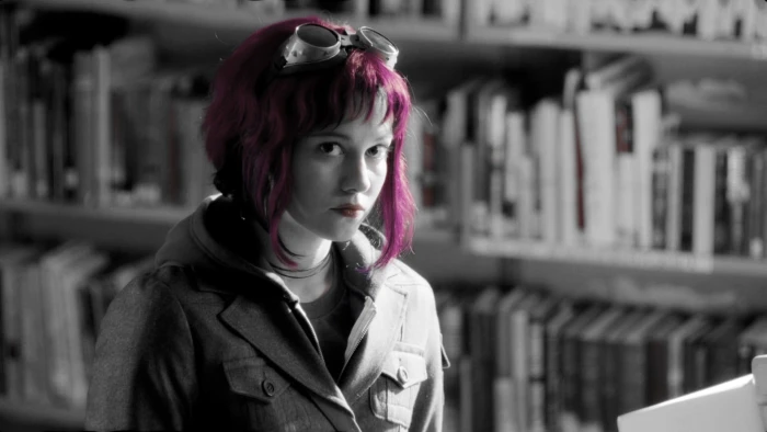 selective color photo of woman with pink hair coloring