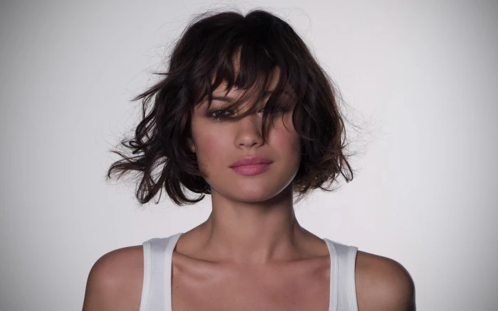 short haired woman wearing white tank top Olga Kurylenko women