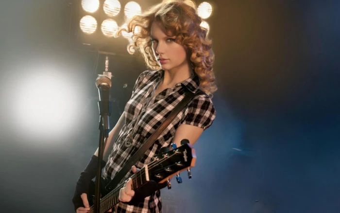 Taylor Swift with Guitar celebrity celebrities girls actress