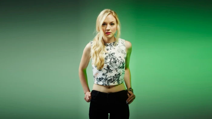 women actress Emily Kinney blonde green background