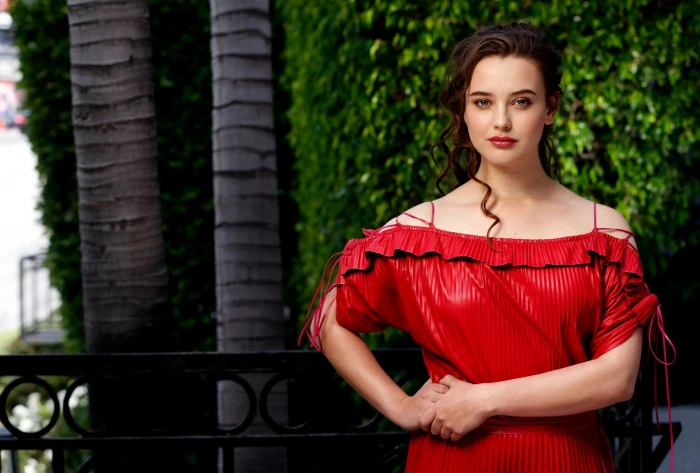 woman wearing red off shoulder dress Actresses Katherine Langford
