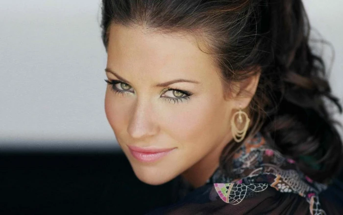 woman's face Evangeline Lilly jewelry brunette green eyes