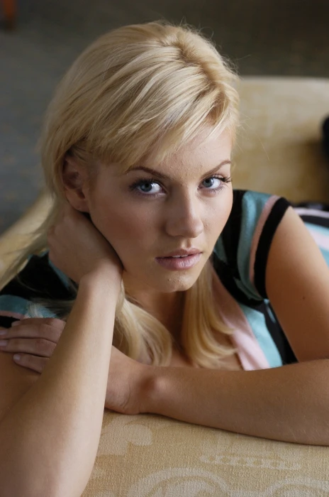 women in blue and black top Elisha Cuthbert actress blonde