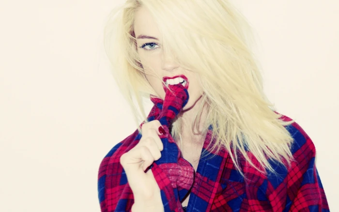 women's red and blue plaid shirt Amber Heard biting blonde