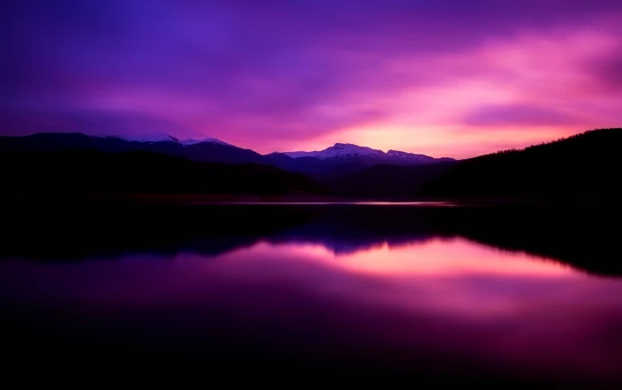 landscape photography of lake under purple sky during daytime 2k