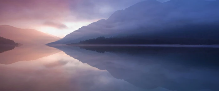 body of water near mountain landscape reflection mist lake 2k