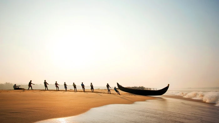 black boat India beach vehicle men sea sunlight bright 2k