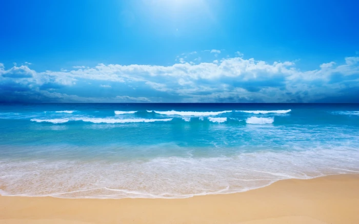 beach sand sky clouds horizon sea water land scenics nature 2k
