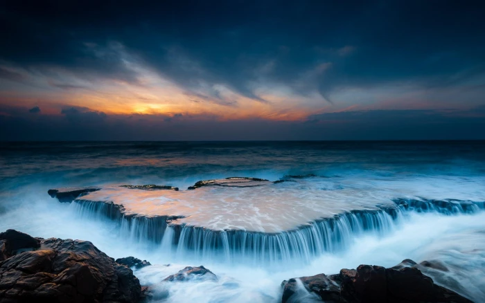 Beautiful landscape ocean beach stones sunrise 2k