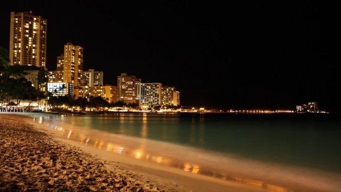body of water night beach lights clouds Hava architecture 2k