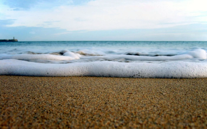 brown sand beach sea land water sky horizon beauty in nature 2k