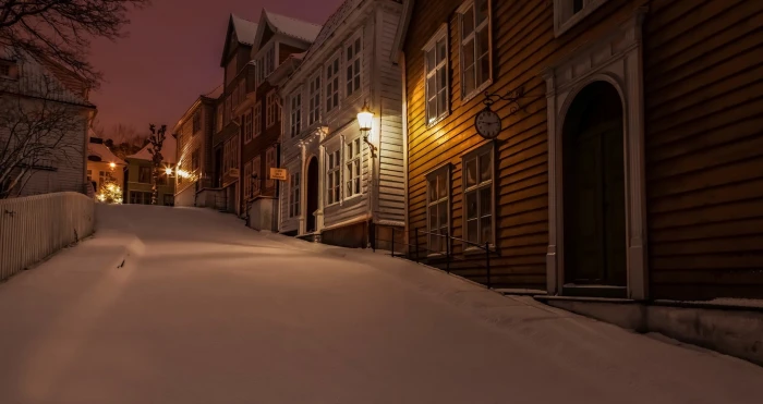yellow wooden house nature winter snow Norway town night 2k