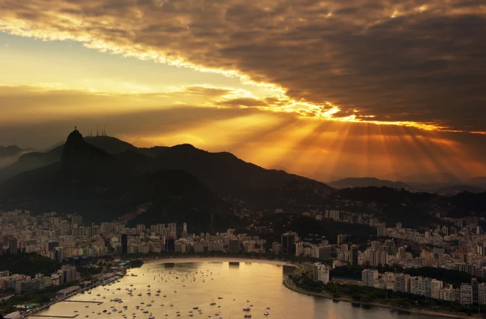 city buildings the sky clouds sunset ocean boats Brazil 2k