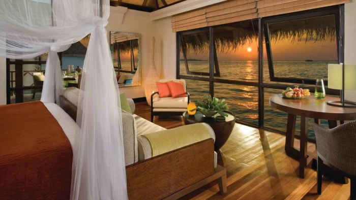 Evening Dusk View Out Of Water Bungalow Maldives hotel room 2k
