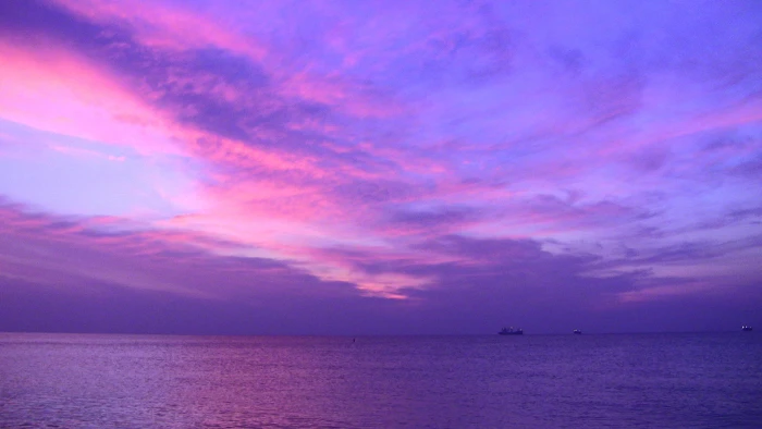 purple clouds on teal sky miami beach Fathers Day 2k