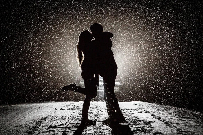 silhoutte photography of man and woman kissing love snow monochrome