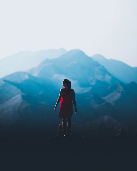 woman standing in front of mountain red dress outdoor person 2k 4k