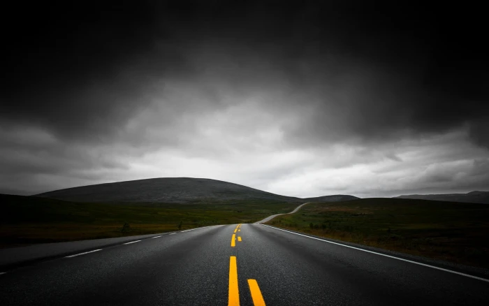 grey concrete road nature landscape highway dark clouds 2k