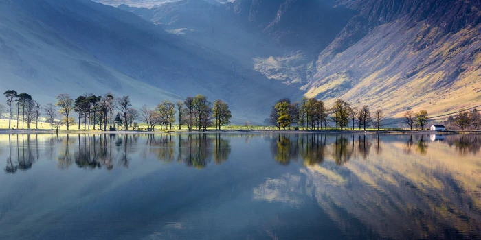 panoramic photography of mountain near on river buttermere lake district
